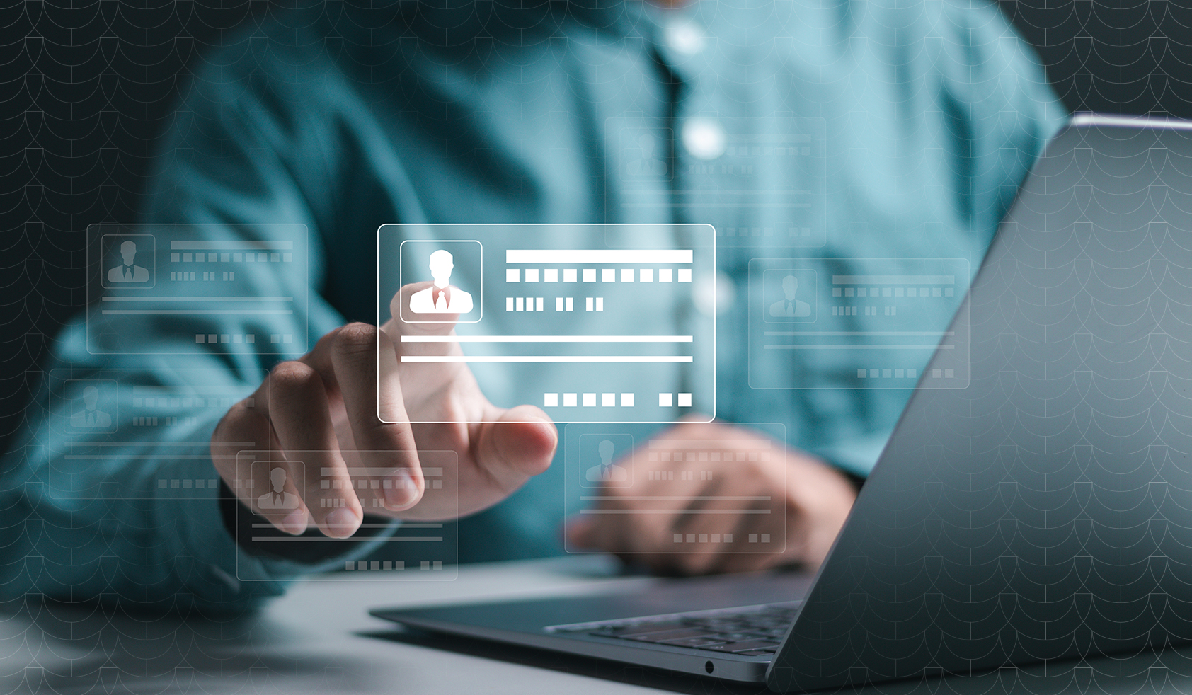 Person interacting with a digital identity management interface on a laptop, symbolizing secure access control systems